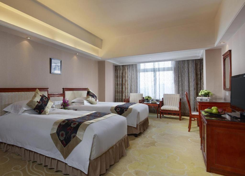 Feicheng Blossom Hotel Exterior foto